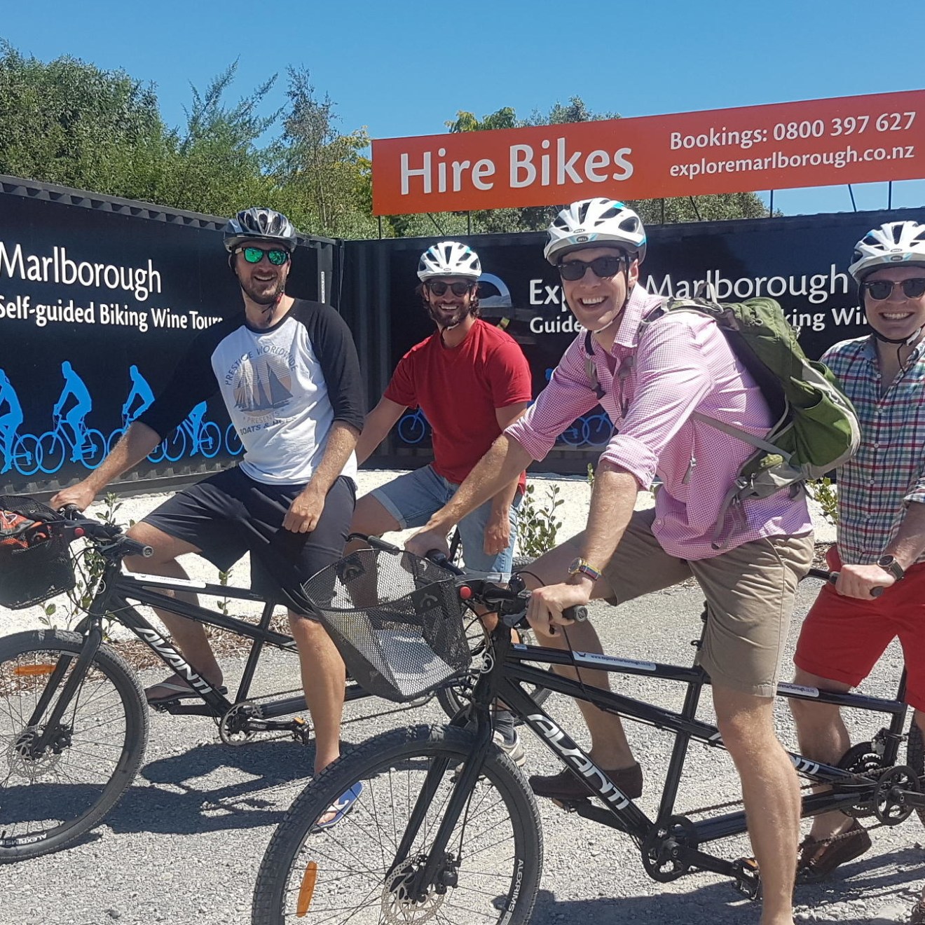 a man riding on the back of a bicycle